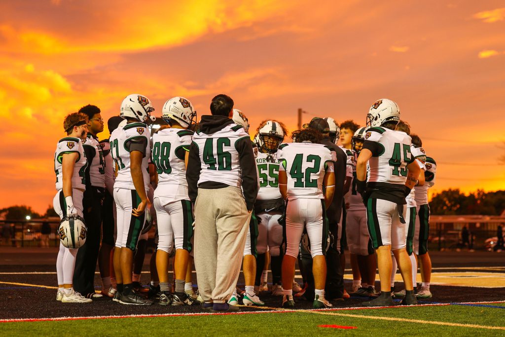 The Norwalk football team gathers during its game against Trumbull on Friday, Sept. 25, 2026. - Photo by Luke Sherman/Norwalk Digital Media and Communication Academy